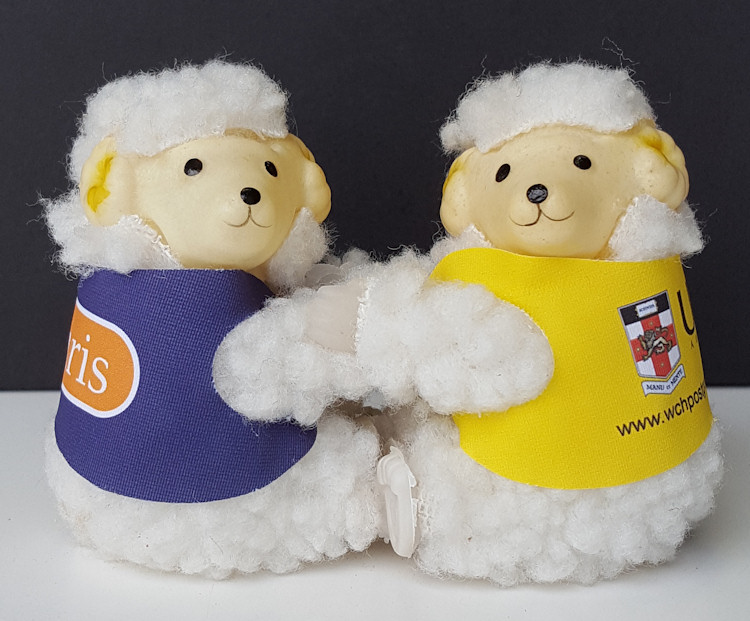 Clip-on koalas in colored jackets with country flags